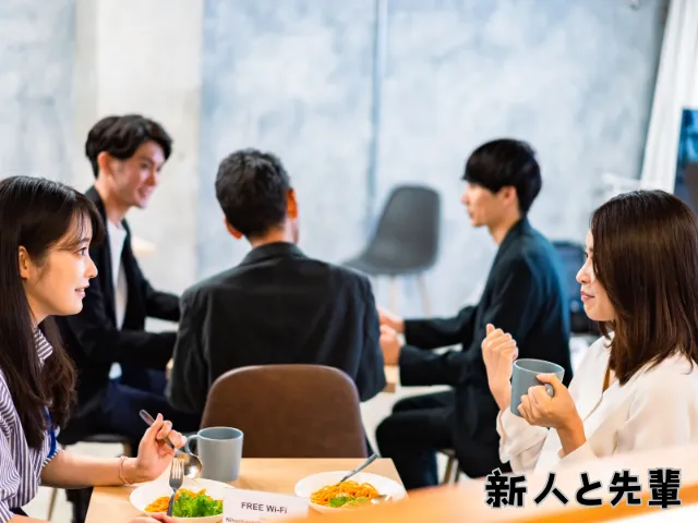 新人が話しかける最初の一言をよく考えて先輩に話かけているところ